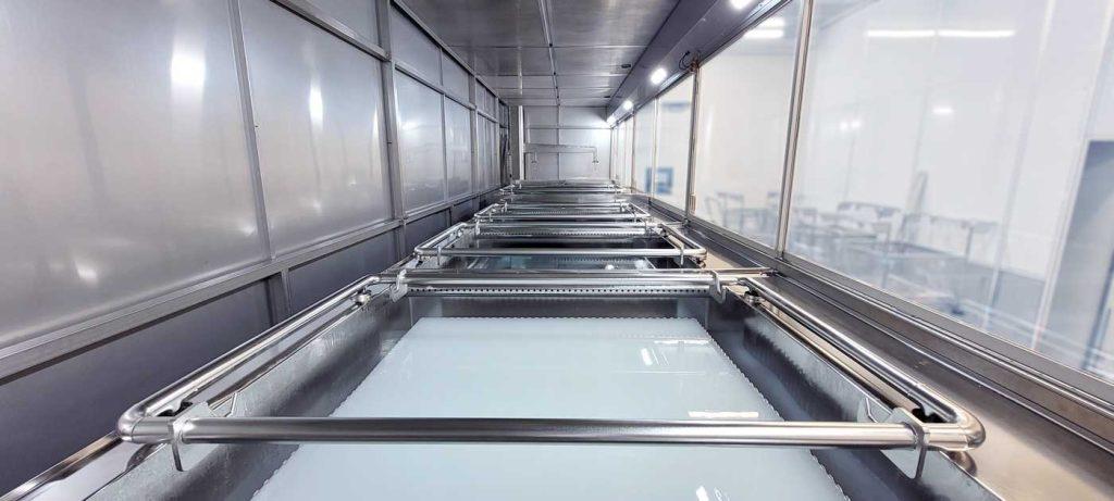 Process tank line with high purity features such as four-sided overflow, electro polished finish and IR welded pipelines